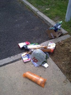 Trash left by McCullough after I cancelled my service and asked them to pick up their cans