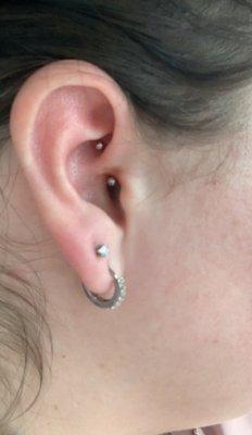 Kat did the Daith piercings (helps with anxiety and migraines) and redid my second lobe piercings