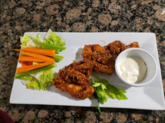 Boneless mango habenero wings