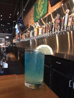 Mermaid lemonade drink: 1 part white rum, 3 parts lemonade, 1 part blue curaçao