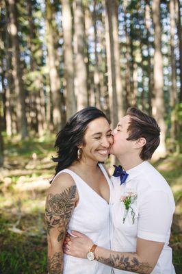 Happy brides in the woods at OrcaSong Farm