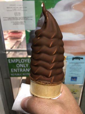 Chocolate dipped small vanilla cone