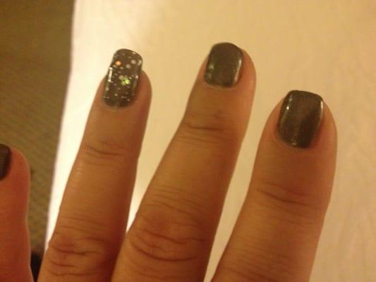 Fun sparkly party nail.