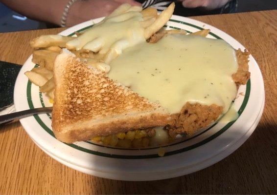 Single chicken fried steak, fries, corn, Texas toast with yellow chicken gravy