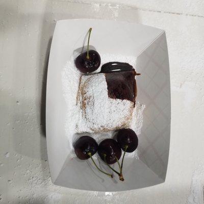 beignet with  chocolate sauce and cherries from Schweiger's Produce