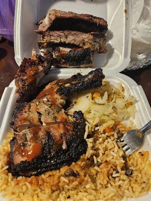 Chicken & Rib combo with rice and peas and cabbage.