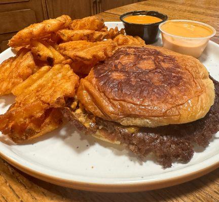 Impossible Smash Burger and Waffle Fries, with Hot Honey Special Sauce and Lo's Sauce.