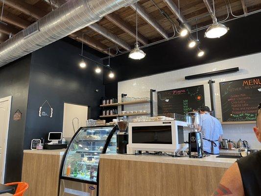 Looking toward back of store. Check out station on the left, with pastry case next to it.