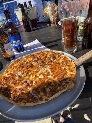 Bacon cheeseburger pizza and Foxbody beer