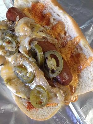 THE HELLHOUND; ghost pepper sauce, cayenne, jalapeños, cheddar-jack & grilled onions