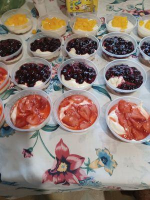 Cheesecake's in a jar strawberry blueberry and mango