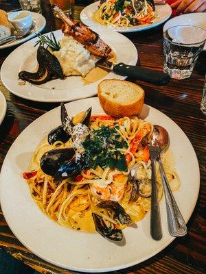 The Seafood Linguini was the best! The French Cut Pork Chop (in back) was also good.