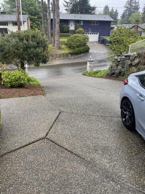 Pressure washing residential driveway