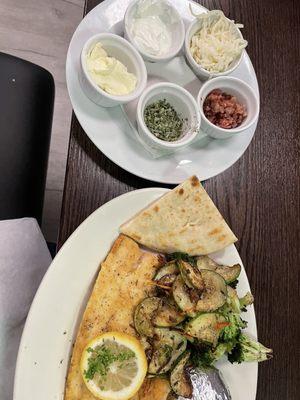 Pan sautéed redfish, baked potato, veggies. Best creamy onion soup and bread pudding.