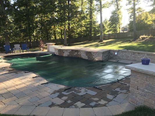 A beautiful pool closed up for the winter.