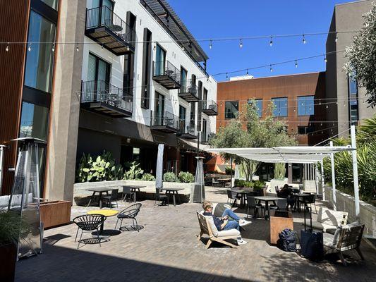 Rear courtyard with outdoor dining.