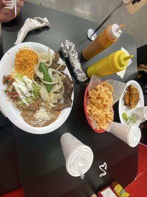 Carne Asada, Chicharrones de harina, and Lengua birria tacos