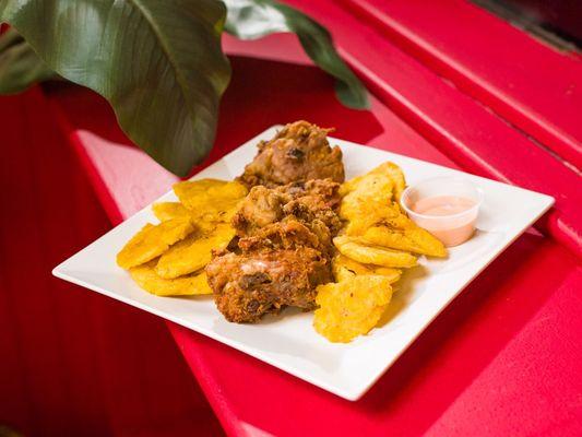 Hand battered chicken with fried green plantains. Order our "Chicharron de Pollo con Tostones" with our signature mayo-ketchup sauce