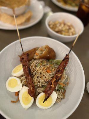 Amazing popcorn, Lola Bowl with filipino bbq pork skewers, egg roll, noodles, boiled egg