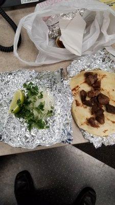 Dried Pork Chunks, Microwaved trying to pass as Carnitas.