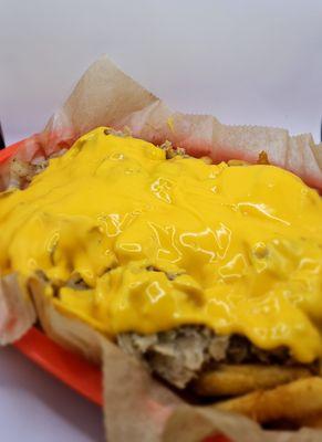 #NamaSteak-Crispy French fries piled high with tender Steak, sautéed Onions, and a smothered in Cheddar Cheese Sauce.