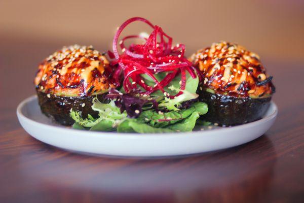 birds nest- stuffed baked avocado with out special crab mix. Served with spicy mayo, unagi, sauce, and sesame seeds.