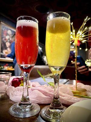 Galentine's Day brunch 2024 left - raspberry sorbet mimosa  right -mango sorbet mimosa