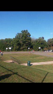 Outdoor basketball courts and note...the trash can!