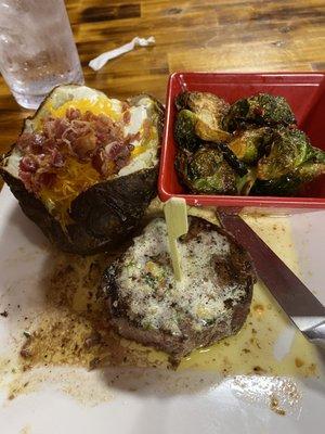 Center cut Tenderloin Filet cooked perfectly tender and juicy! With Brussels sprouts and loaded baked potato!