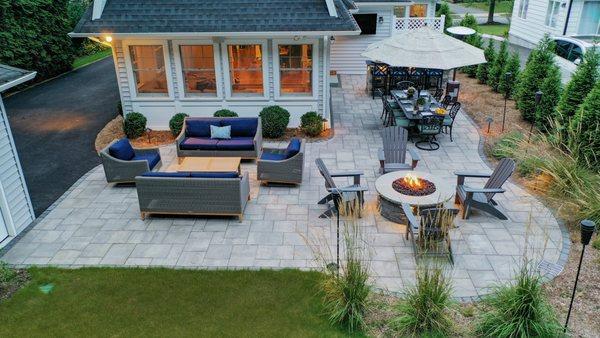 Functional Patio with Outdoor Kitchen & Bar, Fire Pit, and Dinning & Lounging Area.