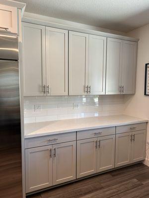 Countertop and backsplash installation - with a fancy electrical outlet added at the last minute - no fuss!