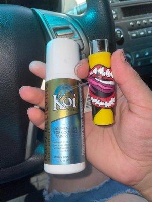 Koi CBD roll on and a cute lighter