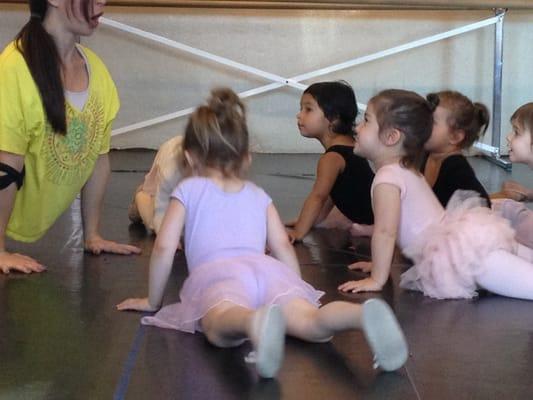 Stretching before the dance exercises begin! (Toddler class)