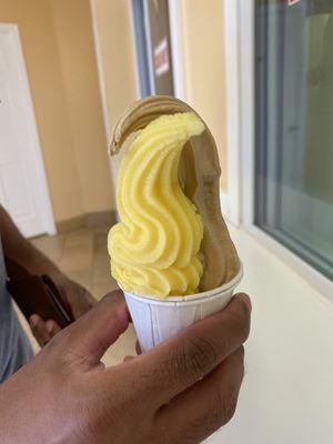 Mango and coffee Italian ice in a squeeze cup