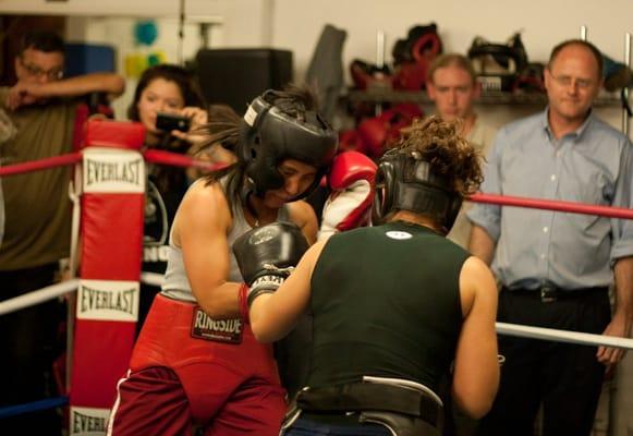 Courtney (red) vs pro fighter Melissa "the Mighty" McMorrow