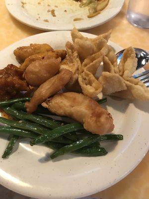 Crab Rangoon, sweet and sour chicken, and garlic green beans.