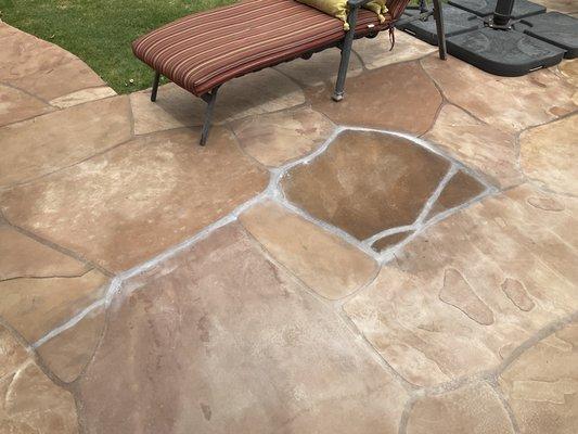 Does this grout look like it matches at all? Flagstone doesn't look clean or enhanced. Replacement stone not a good color match.