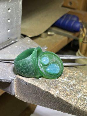 Hand carved wax for a custom ring.