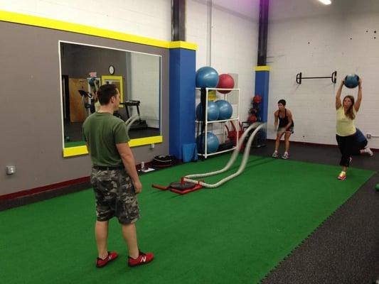 Small group workout on the power sled.