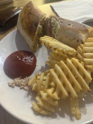 Cajun chicken wrap with waffle fries