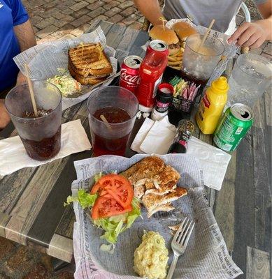 Mahi sandwich with potato salad; patty melt with coleslaw; cheesesteak with French fries