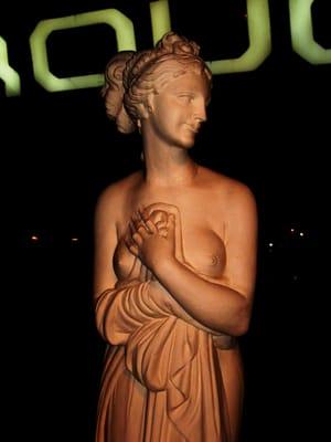 a goddess outside the bar entrance