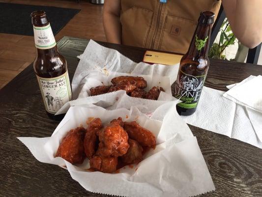 Soy sauce and hot wings with stone IPA and not your fathers ginger ale