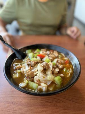 Spicy chicken rice noodle soup