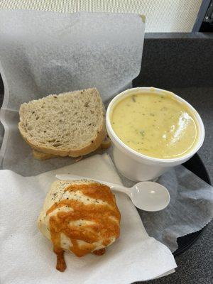 Half sandwich, 12 oz broccoli cheddar soup, and a garlic knot.