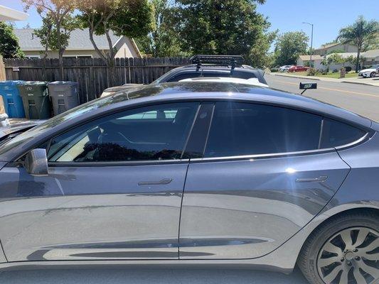 2018 Tesla Model 3 (driver and rear passenger side view). Fronts at Mid Smoke and Rears at Limo.