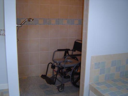 This shower was built to accommodate my customer who is confined to a wheelchair. She rolls into the shower, and uses the spe...