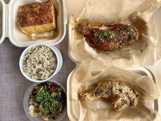 Cornbread, dirty rice, bean salad, herbs and garlic chicken, salted egg chicken