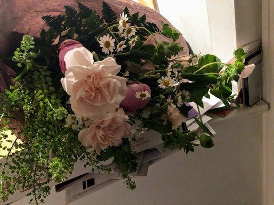 flower arrangement of carnations and sweet pea