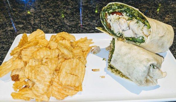 Chicken Pesto Wrap with Arugula, Tomato, Mozzarella & Provolone.